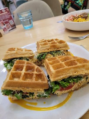 Scrambled tofu waffle sandwich with salad and stuff inside. 5/5. at Lilo Brunch Specialty Coffee in Barcelona