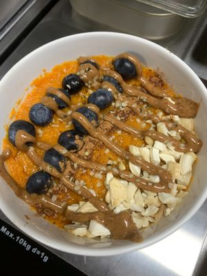 Sweet potato bowl. Roasted sweet potato with blueberries, cashews, almond butter and super seeds. at plant.ed café in Orangeville