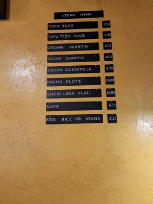 Vegan menu on the wall at J and R Tacos in Merced