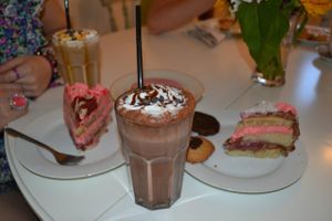 A selection of cakes and a choclate split latte at Cakes 'N' Treats in North West London