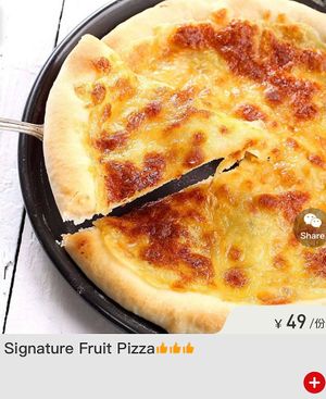 Very special sweetie fruits pizza (with fruits like apple, strawberries, bananas etc)
Only pizzas and cheese milk fans/crackers have milk.  at Juezhengjing Vegetarian Restaurant - Minsheng Street Store - 觉正净素食 民生街店 in Kunming