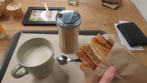 Franzbrötchen-menu w/Cappuccino & entire glass of sugar at Liners Food in Hannover