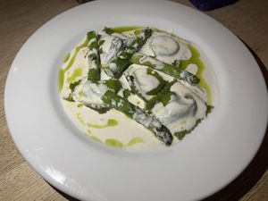 Ravioli with smoked potato, asparagus, wild garlic, one nut  at Oak in Bath
