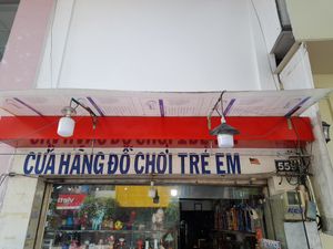 Outside this shop at No Name Permanent Vegan Street Food Stall in Ho Chi Minh City