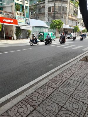 By this street at No Name Permanent Vegan Street Food Stall in Ho Chi Minh City