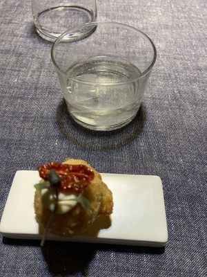 Entree’- pizzetta fritta con fermentato di mandorle e pomodoro confit   at Soul Kitchen - Creatività Vegetale in Turin