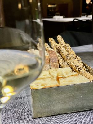 Homemade focaccia and sourdough bread plus mixed-seed grissini  at Soul Kitchen - Creatività Vegetale in Turin