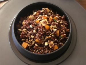 First course: red rice, tempeh, pumpkin and sunflower seeds at Soul Kitchen - Creatività Vegetale in Turin