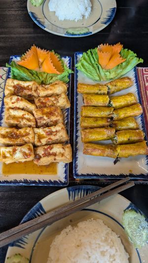 Left Tofu with lemongrass and chili, right spring rolls at Ha Giang Vegetarian Restaurant in Ha Giang
