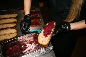 beetroot hummus sandwich | sourdough bread ZE MĚ/ gluten-free bread, my beetroot hummus, grilled zucchini, arugula, walnuts, vegan cheese + leaf salad and pickled onions at Anežka in Prague