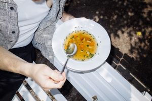 vegetable/ chicken/ beef broth, root vegetables, noodles (can be made gluten-free without noodles), herbs, sourdough bread ZE MĚ/ gluten-free bread  at Anežka in Prague