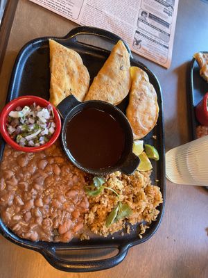 The Jackfruit Quesabirria with beans and rice   at New Day Eatery in Port Angeles