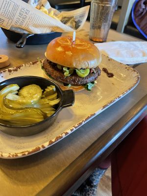 Mediterranean burger with just pickles on side (Comes with fries)  at New Day Eatery in Port Angeles
