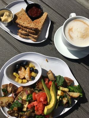 Vegan Hash, Daves Killer toast with Earth Balance butter, and an oat milk latte. delicious! at New Day Eatery in Port Angeles
