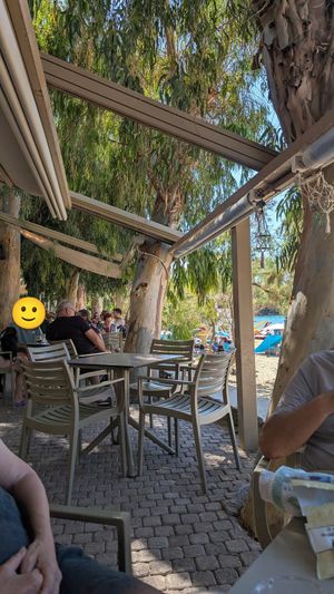Seating next to beach at Paralos Beach Bar in Stoupa