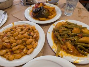 Apologies for the messiness - we may have started eating before I took the photo! 
Stuffed peppers and potatoes, green beans and potatoes and giant beans. at Tzivras in Kefalonia