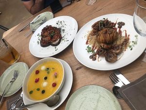 Sopa melon y mango, patata con heura y moussaka vegana at La Capella in Sabadell