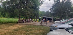 Outdoor seating, play area and farm stand at Broken Spoke Farm in Hillsborough