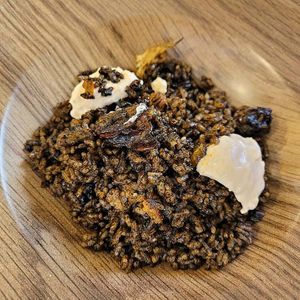 Arroz con tinta de calamar at La Colegiata Food and Drinks in Leon