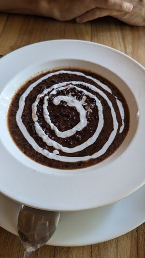 Black rice pudding with coconut cream at Warung Agung Amed in Abang