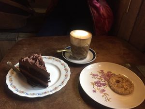 Chocolate cake, coffee and a cookie at 19:77 - VEGAN:DINER+BAR, Home of RAMONES MUSEUM in Berlin