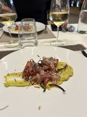 Anguria scottata su letto di guacamole con cipolle caramellate e mandorle  at La Nuova Campana in Castellammare Del Golfo