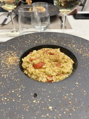 Risotto con crema di zucchine e pomodorini  at La Nuova Campana in Castellammare Del Golfo