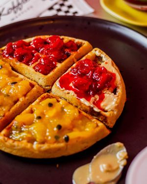 Waffle vegano acompanhado de pasta de amendoim integral e geleias artesanais da casa  at The Koffie Waffles in Brasilia