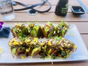 Spicy Yam in the back and Sweet Dragon roll in the front  at Nori in Wilmington