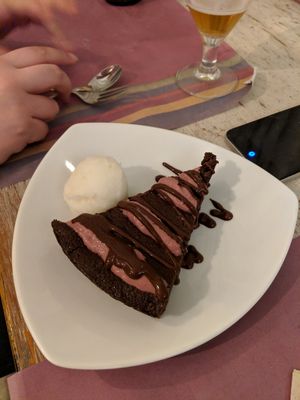 Vegan chocolate carrot cake with vegan lemon ice cream at New Vita Restaurant in Sabadell
