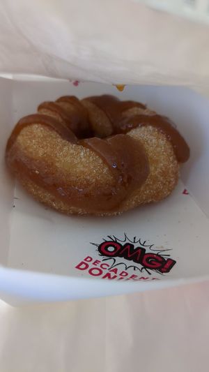 Cinnamon donut drizzled with salted caramel ($4.50) at OMG Decadent Donuts in Bundaberg
