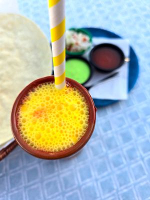 Vegan Mango Lassi
A refreshing fresh vegan yogurt based drink made from soy ,mango and spices . 
 at Tinge of Turmeric in Tenerife