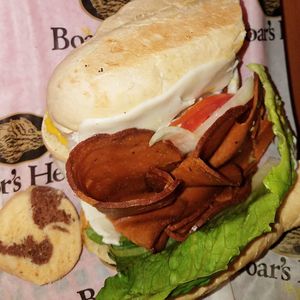 Vegan pastrami sandwich with vegan provolone at Muffin Top Bakery in Redlands