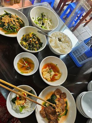They always bring about 3 or 4 incredible free dishes with whatever you order at Katze in Hanoi