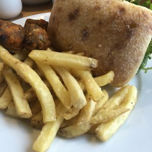 Hummus, rocket and falafel panini and fries   at The Lookout Cafe in Weymouth