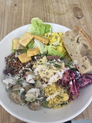 Tofu scramble, marinated tofu, potato salad, veggies, couscous   at Black Cat in East London