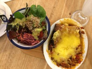 Lasagna and salad. at Black Cat in East London