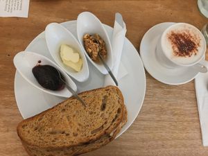 jam + spreads with a cappuccino  at Black Cat in East London
