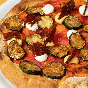 Zucchina Curiosa, with fried zucchini, paprika hummus, cashew creamy cheese and tomato wafer at Pit'sa in Milan