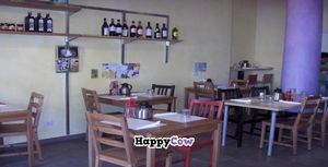 Indoor seating at La Pentola Vegana in Monza