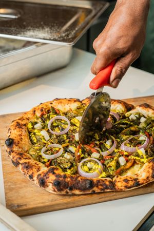 Spicy zhoug Pizza at Canvas V in New Delhi