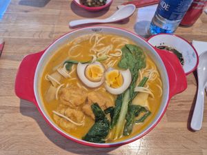 Tom yum broth soup (recently made vegan) with tofu, egg and veg at Malatang Express in Durham