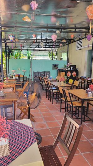 Outdoor seating at Can Nam Quan in Hoi An