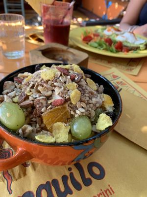 Vegan Stack, yogurt with fruit, oats, and nuts  at Tranquilo in Santorini