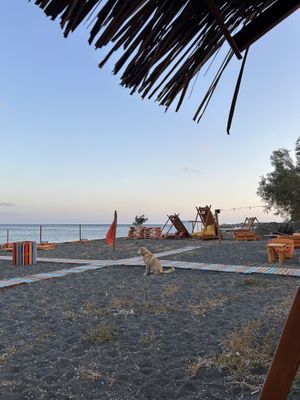 seating on the beachh  at Tranquilo in Santorini