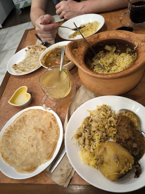 Onion Paratha, 60฿
Chycken Tikka Masala, 300฿
Mushroom Biryani, 300฿

Plain Paratha, 50฿
Lemongrass Bael Herbal Tea, 100฿ at Ubuntu Eat in Phuket