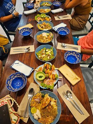 Khao soi, tea leaf salad, sausage kebab  at Ubuntu Eat in Phuket