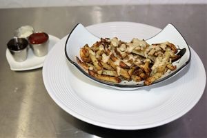 Cheesy Ghana fries at Nkwa Dua in Accra