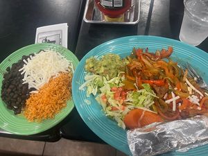 Veggie fajitas with rice, black beans, and vegan cheese (you’ll have to ask to have them made vegan).  at La Caguama Go Grande in Yucca Valley