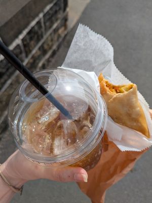 Veggie samosa and fizzy peach tea at Puck & Pollen in Sheffield